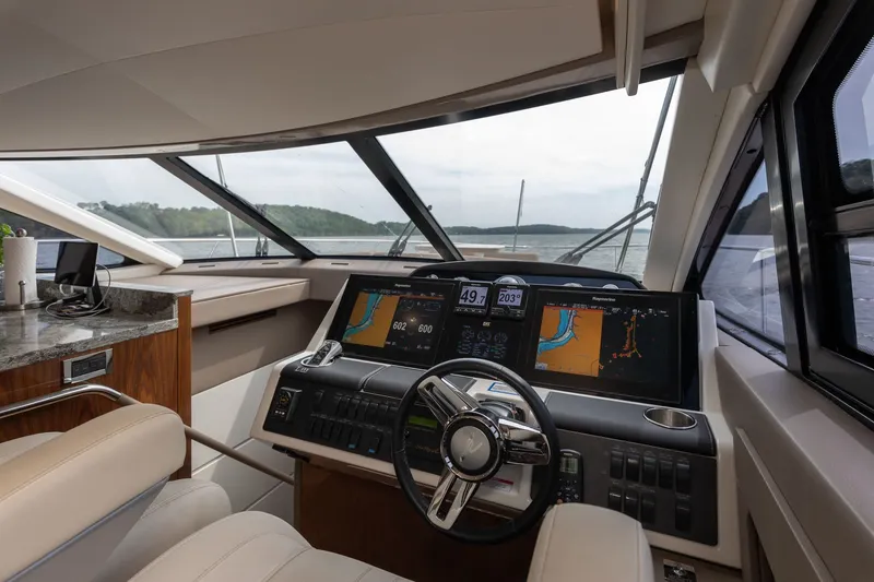 Slide: The Image of Interior view of 2018 Sea Ray L650 Fly cockpit. - 26