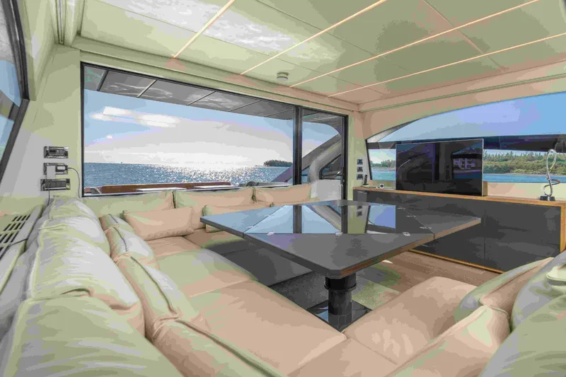 Slide: The Image of Luxurious interior of 2018 Pershing 70 yacht with ocean view and modern furnishings. - 18