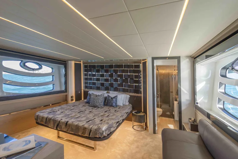 Slide: The Image of Luxurious interior of 2018 Pershing 70 yacht with modern bedroom design. - 2