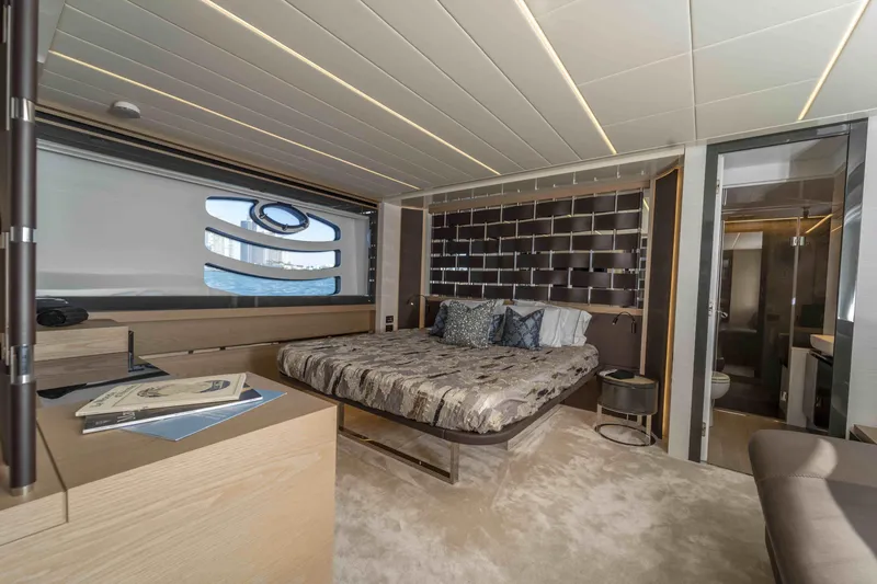 Slide: The Image of Luxurious bedroom interior of 2018 Pershing 70 yacht with modern design and elegant furnishings. - 3