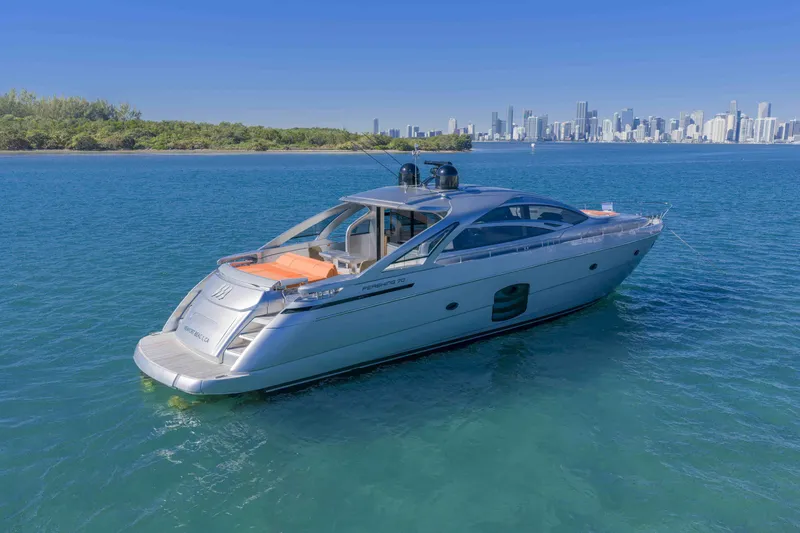 Slide: The Image of 2018 Pershing 70 yacht on blue water with city skyline in background. - 30