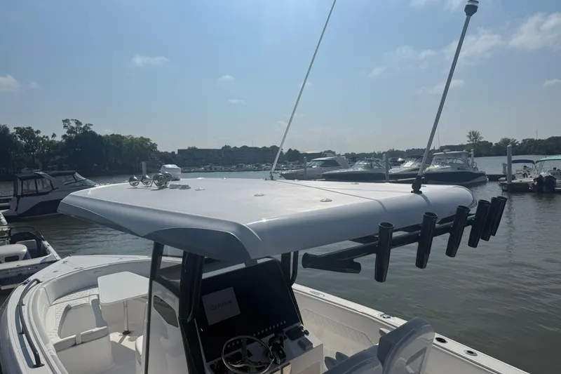 Slide: The Image of 2023 Stamas 31T Aventura boat docked, featuring a sleek design and modern equipment. - 18