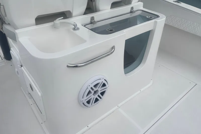 Slide: The Image of 2023 Stamas 31T Aventura boat interior with sink and storage compartment. - 28