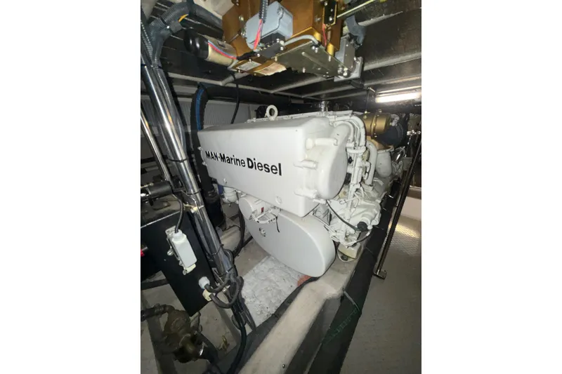 Slide: The Image of Engine room of 2001 Sea Ray 560 Sedan Bridge with MAN Marine Diesel engine. - 63