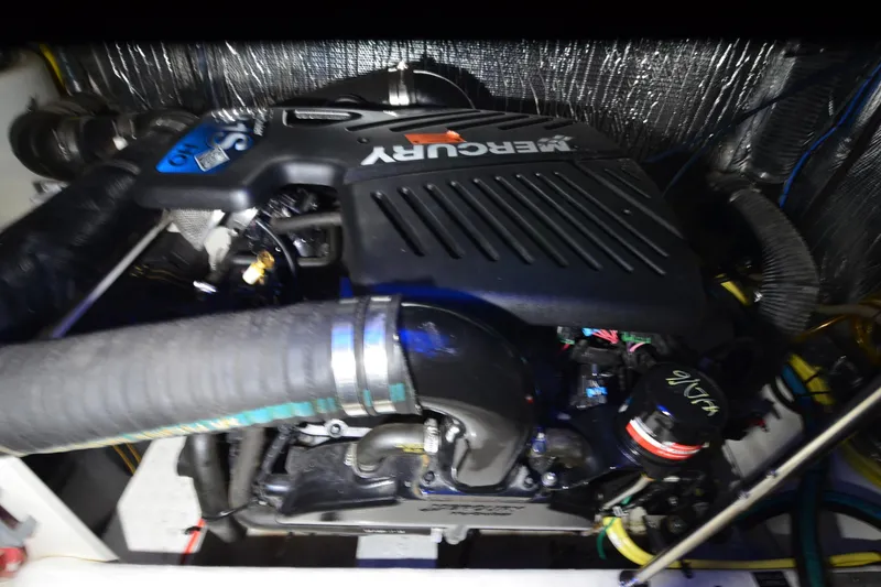 Slide: The Image of Engine compartment of 2003 Cruisers Yachts 4370 Express with Mercury engine. - 34