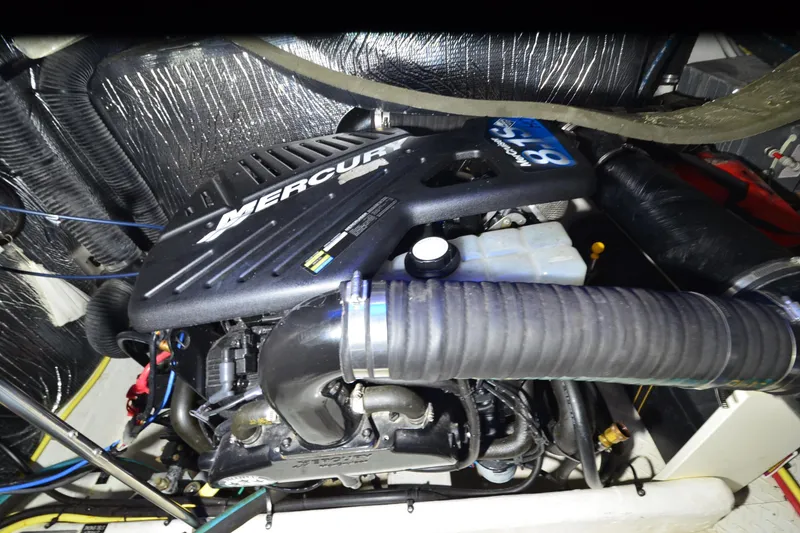 Slide: The Image of Engine compartment of 2003 Cruisers Yachts 4370 Express with MerCruiser engine. - 36
