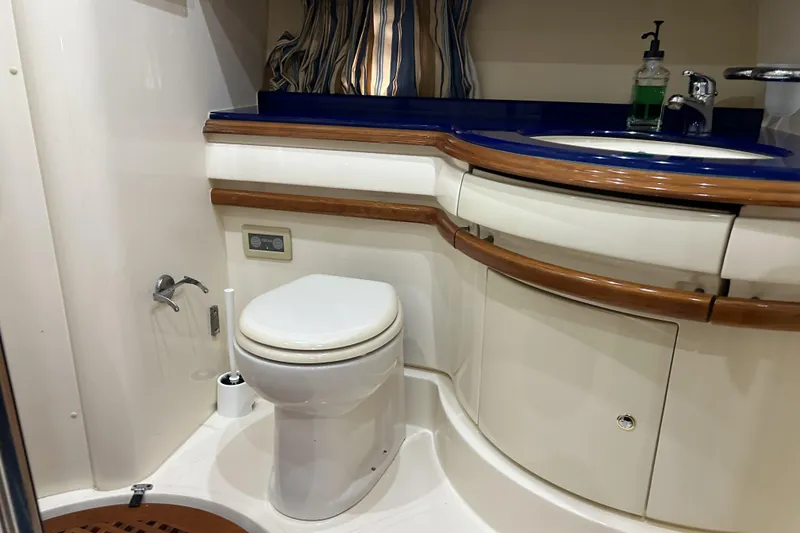Slide: The Image of Luxurious bathroom in 2003 Azimut 55 yacht with modern fixtures and elegant design. - 15