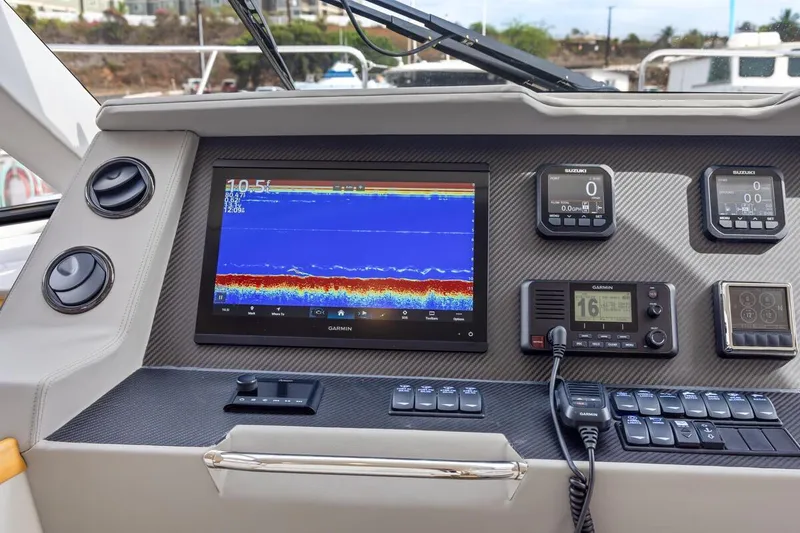 Slide: The Image of Dashboard of 2023 ArrowCat 420 Flybridge with navigation and control systems. - 27