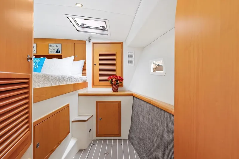 Slide: The Image of Luxurious cabin interior of 2023 ArrowCat 420 Flybridge with modern wood finishes. - 48