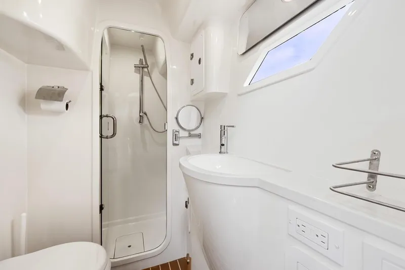 Slide: The Image of Modern bathroom in 2023 ArrowCat 420 Flybridge yacht with shower and sleek fixtures. - 52