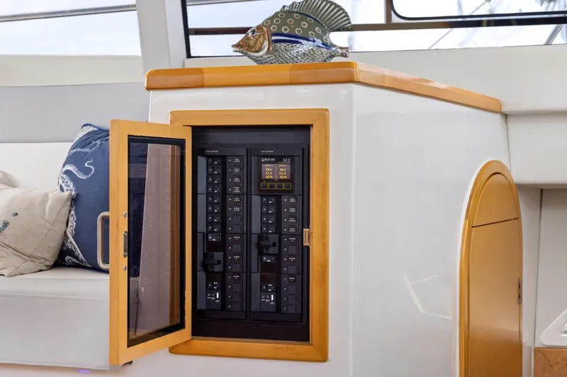 Slide: The Image of Electrical panel on 2023 ArrowCat 420 Flybridge yacht, featuring modern controls and stylish interior design. - 54
