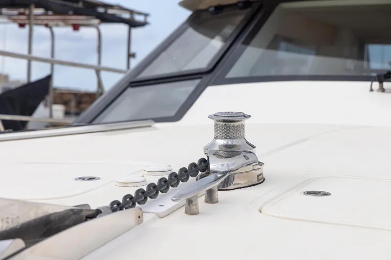 Slide: The Image of 2023 ArrowCat 420 Flybridge yacht deck with anchor chain and winch. - 62