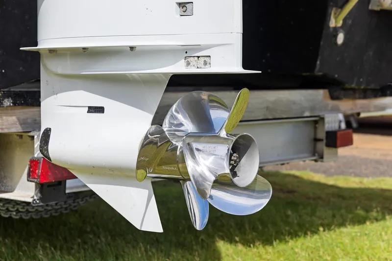Slide: The Image of Shiny propeller of 2023 ArrowCat 420 Flybridge on trailer, close-up view. - 72