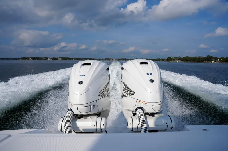 Slide: The Image of Twin Yamaha V8 XTO Offshore engines powering a 2023 Everglades 340 Dual Console boat. - 15