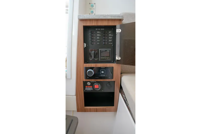 Slide: The Image of Interior of 2023 Everglades 340 Dual Console boat with TV and seating area. - 20