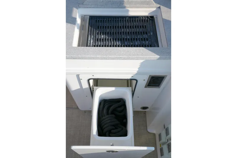 Slide: The Image of Built-in grill on 2023 Everglades 340 Dual Console boat, featuring sleek countertop design. - 24