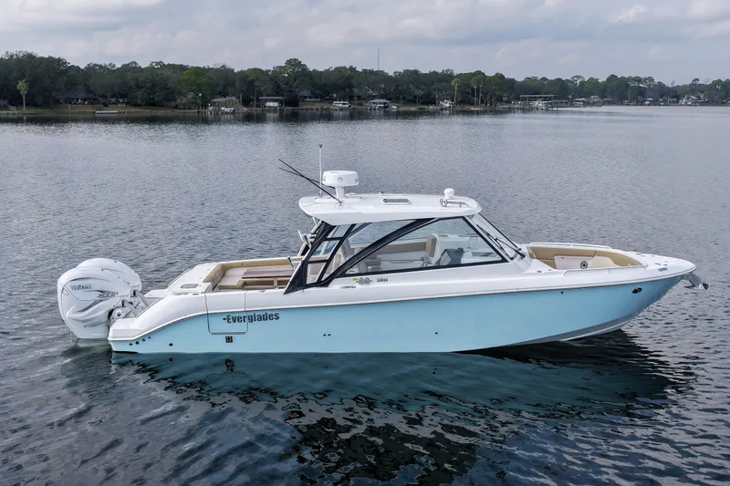 Slide: The Image of Overhead view of 2023 Everglades 340 Dual Console boat on water. - 40