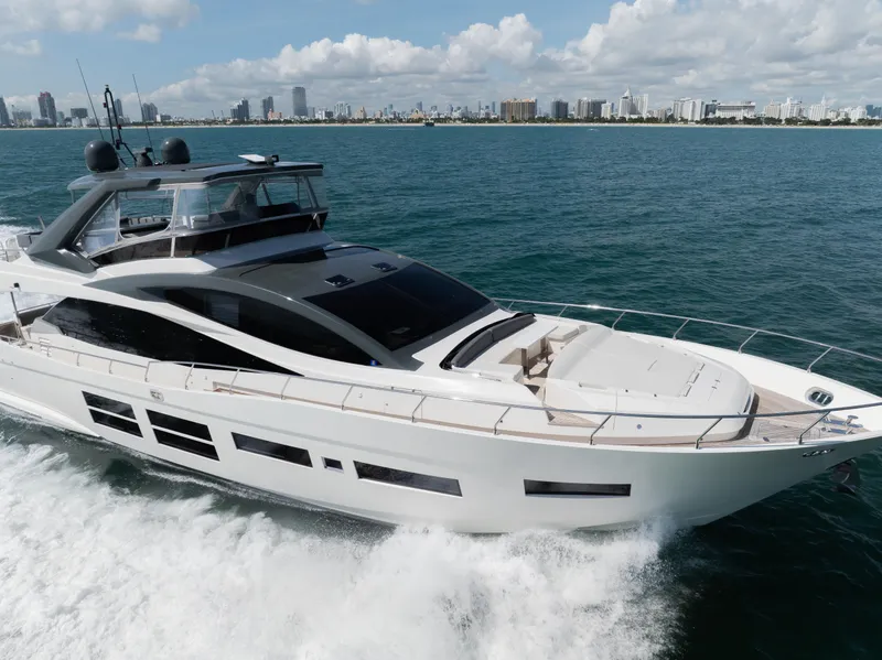 Slide: The Image of Luxury Astondoa 80 GLX yacht cruising near city skyline, 2016 model. - 10