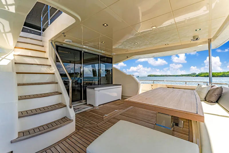 Slide: The Image of Luxurious 2016 Astondoa 80 GLX yacht deck with elegant seating and scenic ocean view. - 29