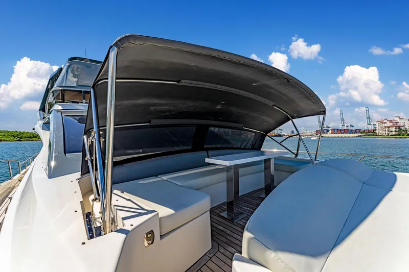 Slide: The Image of Luxury Astondoa 80 GLX yacht deck with seating, 2016 model, under a sunny sky. - 33