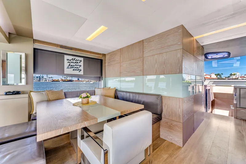 Slide: The Image of Luxurious interior of 2016 Astondoa 80 GLX yacht with elegant dining area and waterfront view. - 44