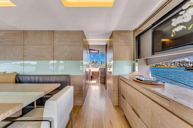 Slide: The Image of Luxurious interior of 2016 Astondoa 80 GLX yacht with modern dining area and scenic window view. - 45