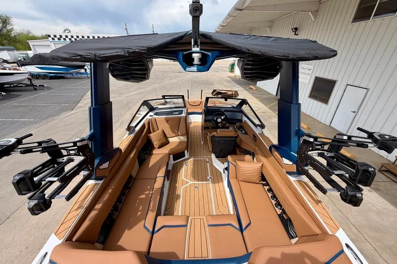 Slide: The Image of 2026 Nautique Super Air Nautique G23 boat with luxurious interior and advanced features. - 16