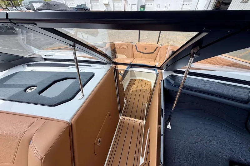 Slide: The Image of 2026 Nautique Super Air Nautique G23 interior with sleek design and premium seating. - 25