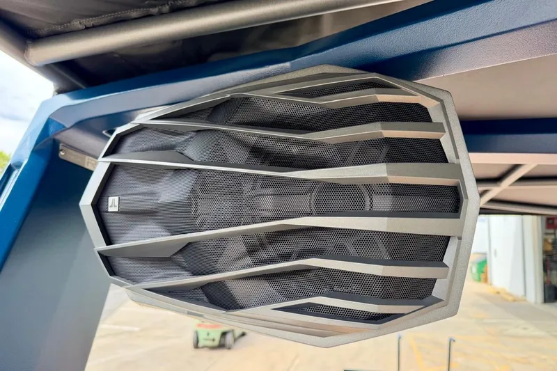 Slide: The Image of Close-up of a JL Audio speaker on a 2026 Nautique Super Air Nautique G23 boat. - 39