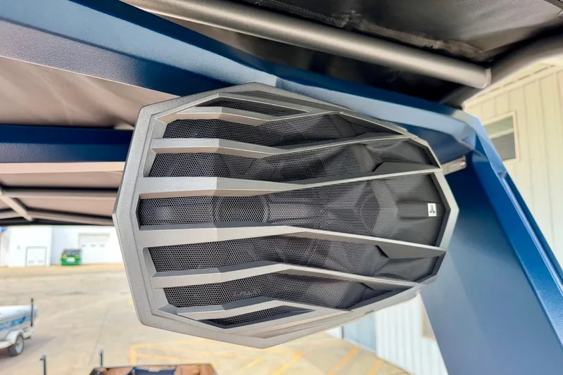Slide: The Image of Close-up of a speaker on a 2026 Nautique Super Air Nautique G23 boat. - 40