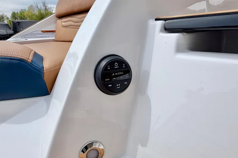Slide: The Image of 2026 Nautique Super Air Nautique G23 interior with JL Audio control panel. - 43