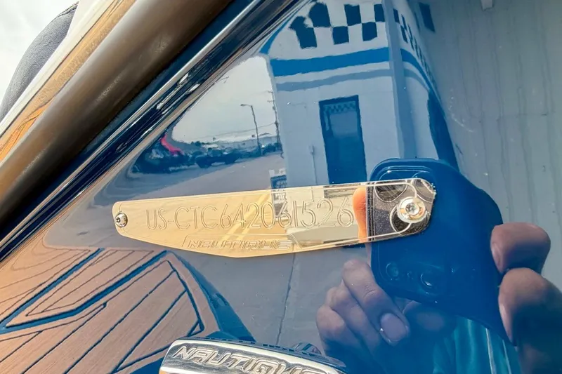 Slide: The Image of 2026 Nautique Super Air Nautique G23 hull identification number plate. - 44