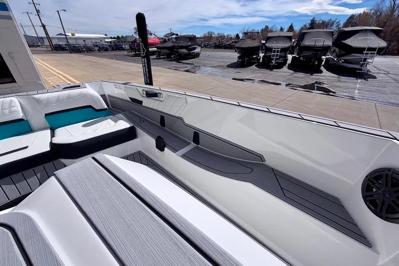 Slide: The Image of 2026 Nautique Ski Nautique boat interior with sleek seating and modern design. - 13