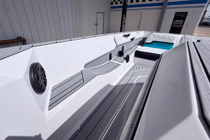 Slide: The Image of 2026 Nautique Ski Nautique boat interior with sleek seating and modern design. - 14