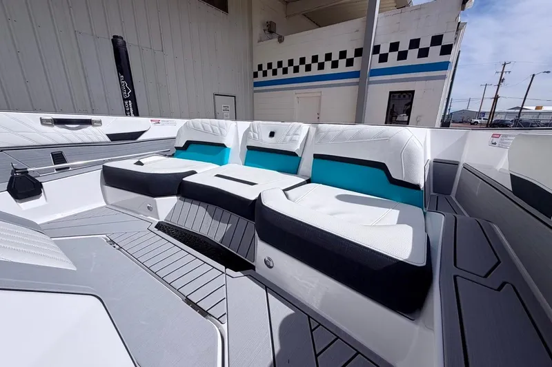 Slide: The Image of 2026 Nautique Ski Nautique boat interior with modern seating and sleek design. - 15