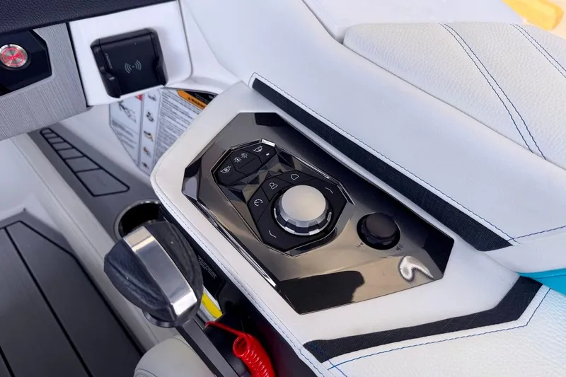 Slide: The Image of Control panel of 2026 Nautique Ski Nautique boat with modern design and features. - 18