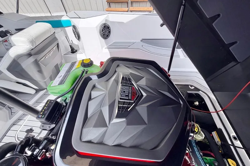 Slide: The Image of 2026 Nautique Ski Nautique boat engine compartment with modern design and components. - 24