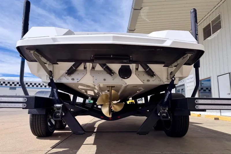 Slide: The Image of 2026 Nautique Ski Nautique boat on trailer, showcasing propeller and hull design. - 6