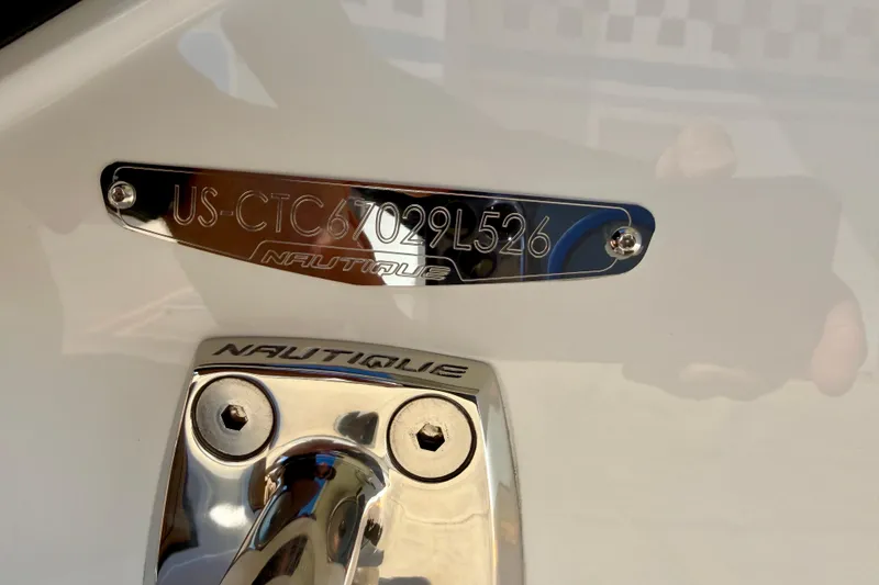 Slide: The Image of 2026 Nautique Super Air Nautique S21 hull identification number plate. - 37