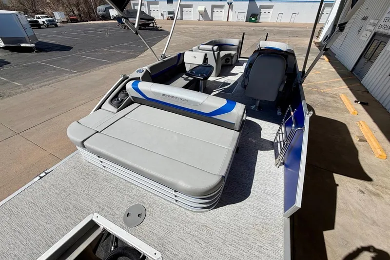 Slide: The Image of 2026 Bennington 22 SX Swingback pontoon boat with spacious seating and modern design. - 15
