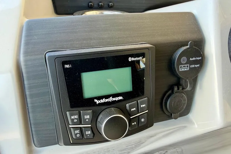 Slide: The Image of Rockford Fosgate PMX-1 audio system on 2026 Bennington 22 SX Swingback boat dashboard. - 29