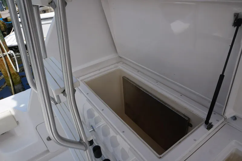 Slide: The Image of Open storage compartment on 2005 Mirage Yachts 40 Convertible boat deck. - 14