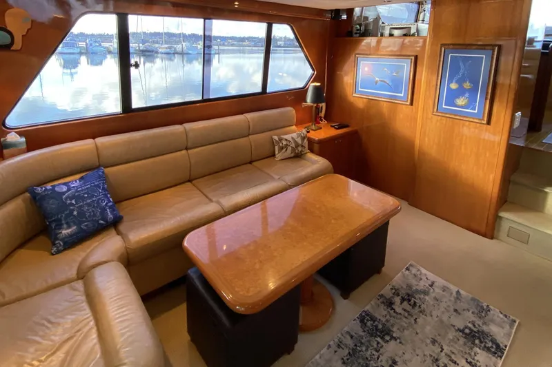 Slide: The Image of Luxurious interior of 2000 Compass 55 yacht with leather seating and elegant decor. - 19