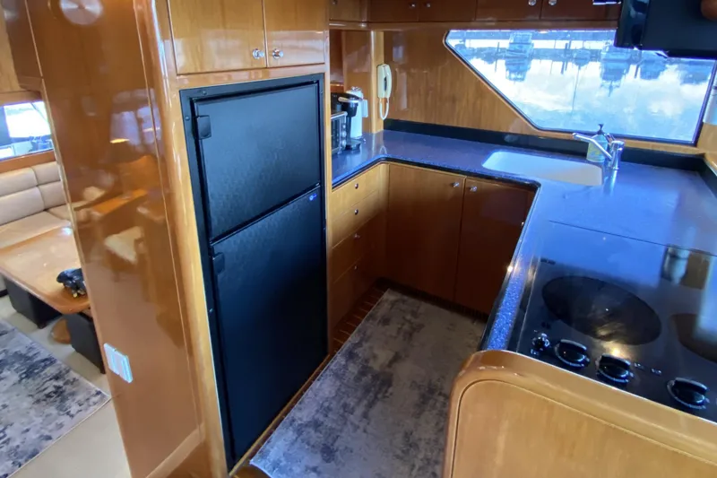 Slide: The Image of Luxurious kitchen interior of 2000 Compass 55 yacht with modern appliances. - 23