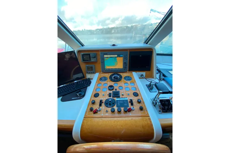 Slide: The Image of Control console of a 2000 Compass 55 with navigation system. - 41