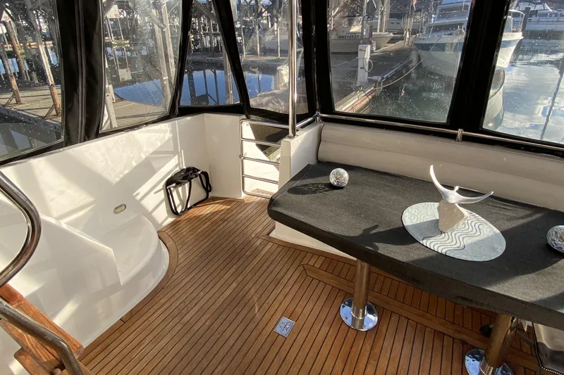 Slide: The Image of Interior of 2000 Compass 55 yacht with wooden flooring and modern decor. - 7