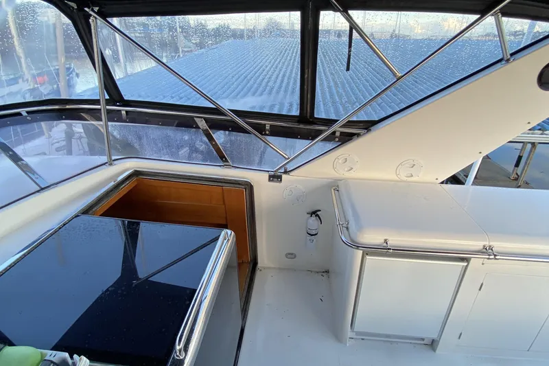 Slide: The Image of Interior view of a 2000 Compass 55 yacht with sleek design and modern amenities. - 77