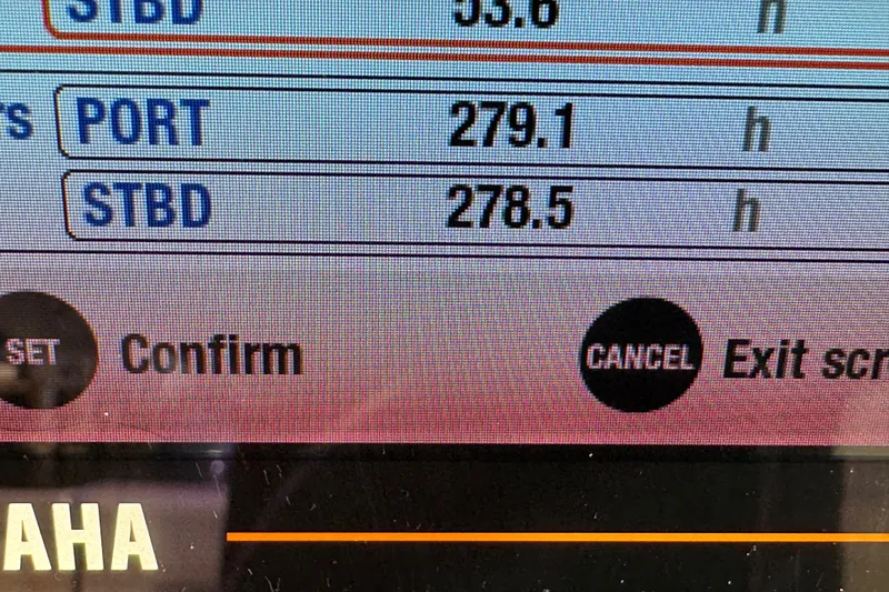 Slide: The Image of Display screen showing engine hours for Pursuit DC 266 Dual Console, 2022 model. - 63