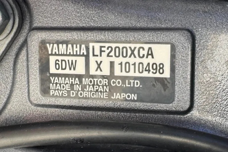 Slide: The Image of Yamaha LF200XCA engine label on 2022 Pursuit DC 266 Dual Console boat. - 85