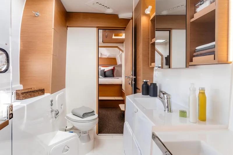Slide: The Image of Luxurious bathroom interior of 2026 Excess 11 yacht, featuring modern fixtures and wooden accents. - 15